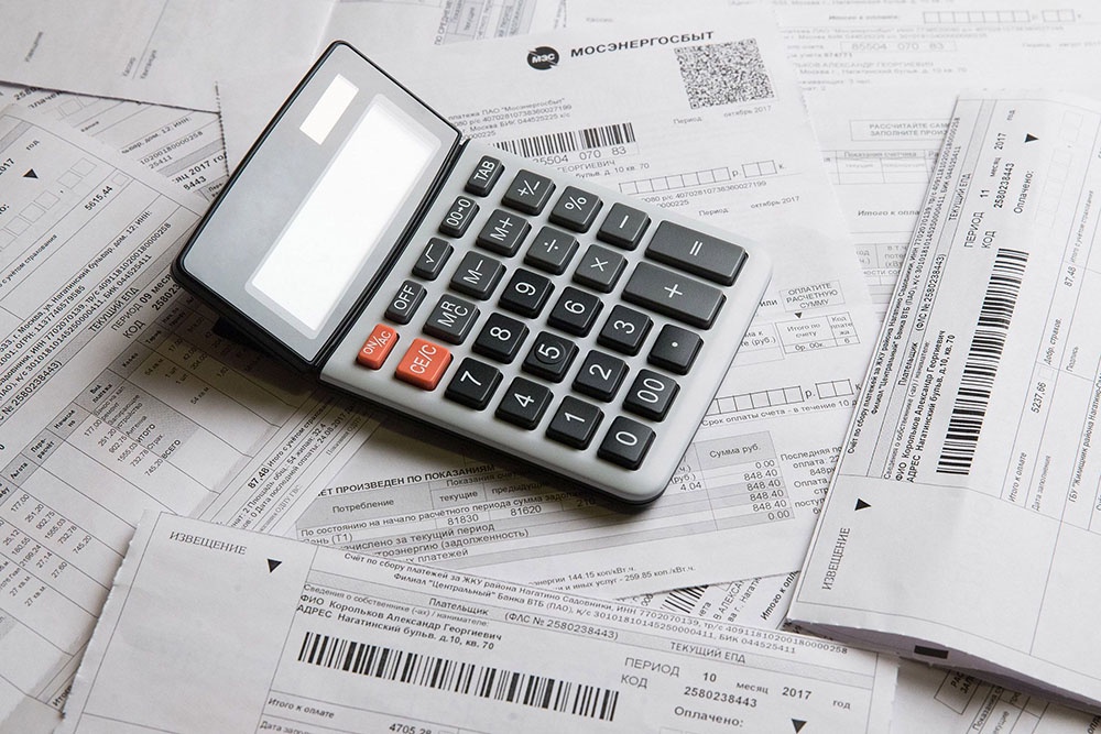 Счета за коммунальные услуги и калькулятор