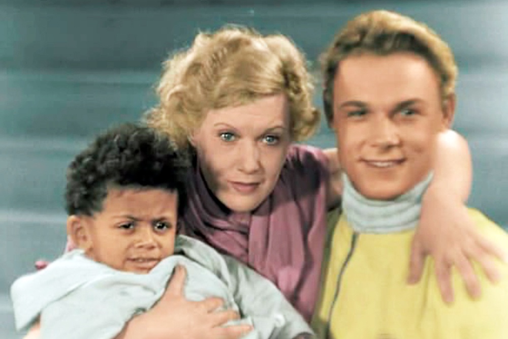 Джим Паттерсон, Любовь Орлова и Сергей Столяров в фильме "Цирк". 1936 год. За первые две недели проката фильм Григория Александрова посмотрели в Москве миллион человек.