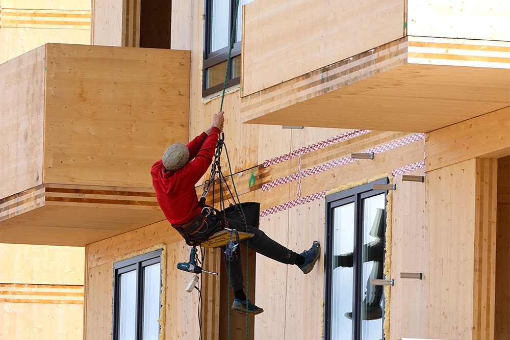 Многоэтажные жилые дома из дерева построены в Вологодской области.